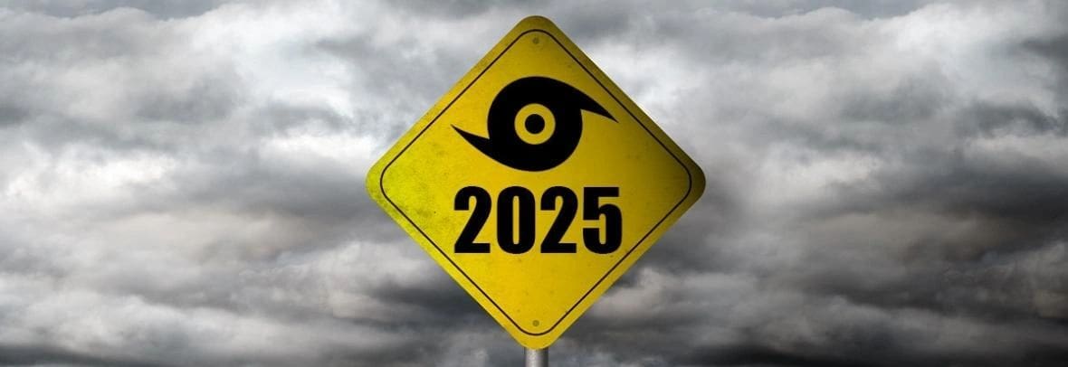 Yellow sign with a black hurricane symbol and the year 2025.
